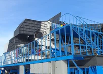 Alimentador de delantal de placa