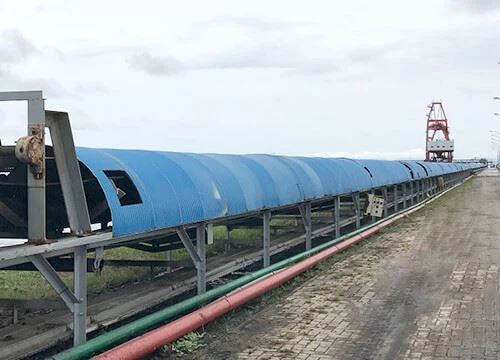 Cubierta de capó para cinta transportadora